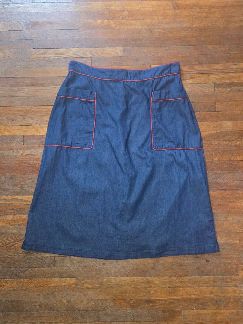 Trollied Dolly Navy Chambray Midi A-line Skirt with Red Piping Details